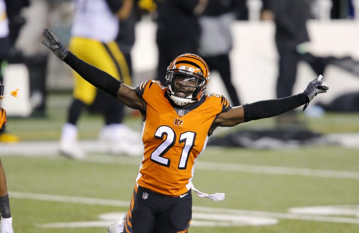 Cincinnati Bengals cornerback Mackensie Alexander (21) and cornerback William Jackson (22) celebrate as the time winds down on the upset win over Pittsburgh Steelers at Paul Brown Stadium.